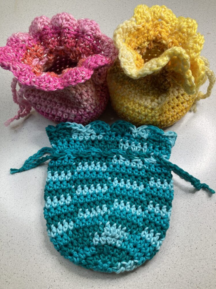 3-small-crochet-gift-bags-blue-yellow-pink