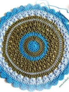 Olive green, blue and white mandala doily