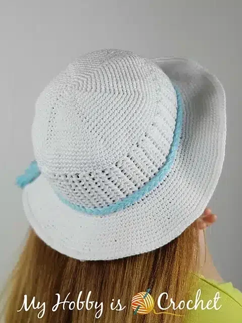 White crochet sun hat with blue band