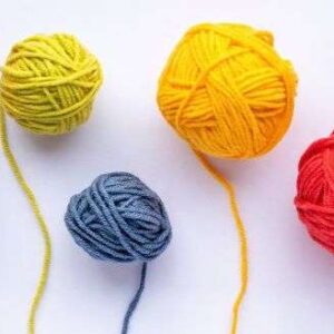 line-of-coloured-balls-of-yarn