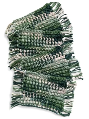 green and white fringed crochet mug rugs