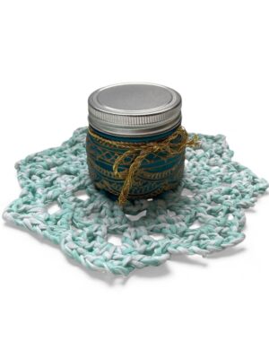 candle on crochet mat doily