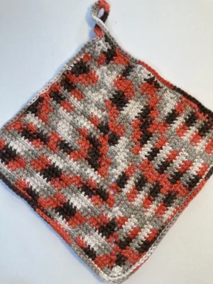 orange brown grey and white potholder