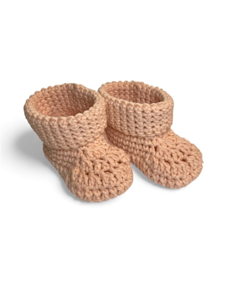 crochet baby booties in light salmon