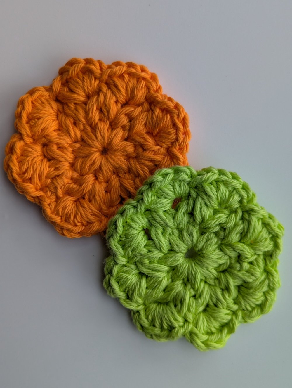reusable makeup pads orange and green